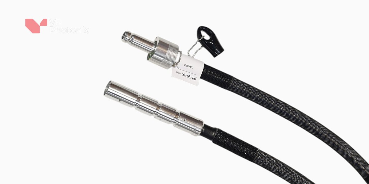 Optical fiber assembly with its two terminations beside a purchasing specification card