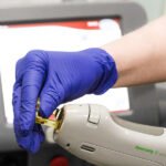 Packaged laser component beside a checklist for identifying a missing part reference.